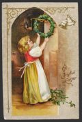 A Joyful Easter ~ Girl Hangs Wreath Postcard